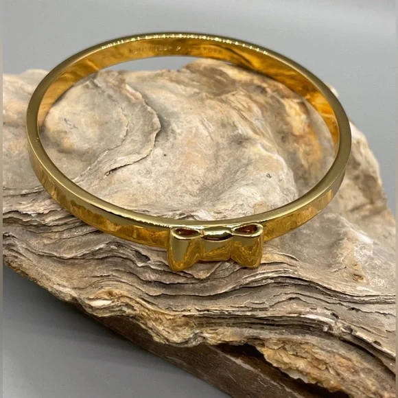 KATE SPADE TAKE A BOW GOLD TONE METAL BANGLE BRACELET Feminine Dressy Dainty - Picture 6 of 7